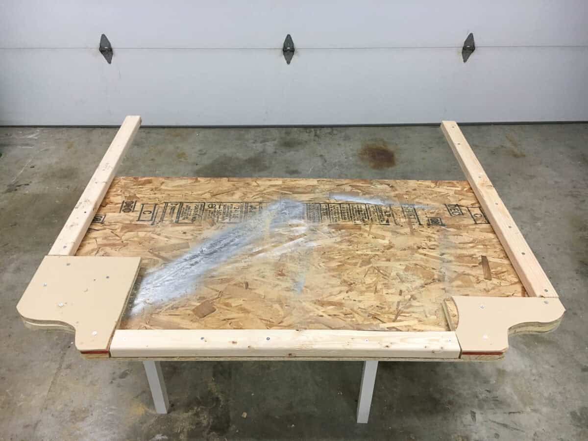 Top view of the headboard layed out on the garage floor.