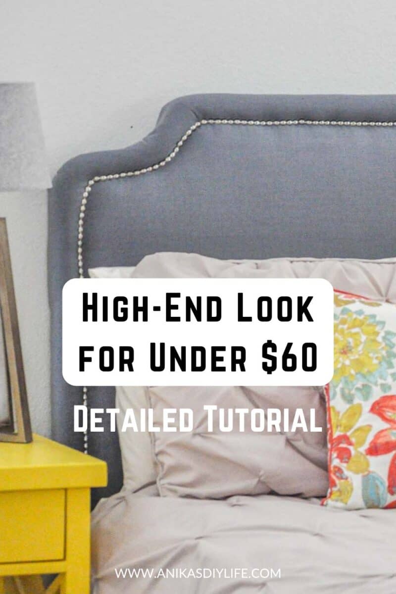 DIY Gray upholstered headboard with gold nailhead trim with colorful pillows and text overlay - high end look for under $60