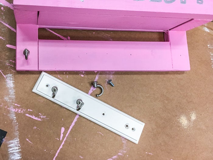 attaching hooks to the bottom of the DIY desk organizer