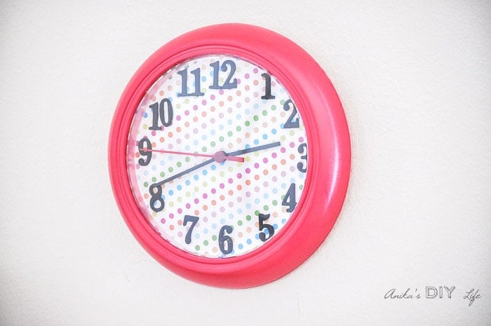 Ikea Rushc wall clock makeover with colored scrapbook paper 