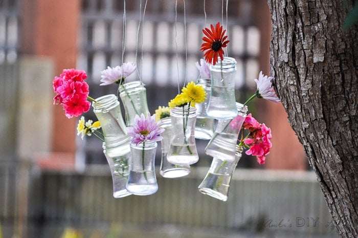 pretty spring decor with recycled glass bottles