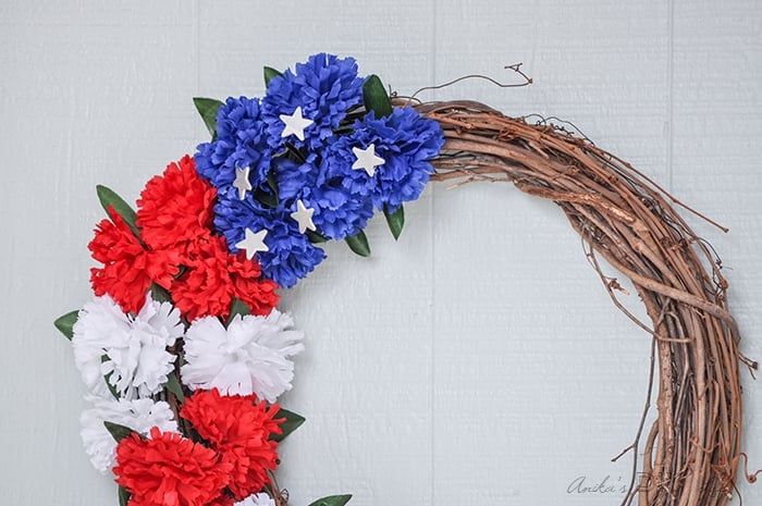 Attaching stars to the patriotic wreath