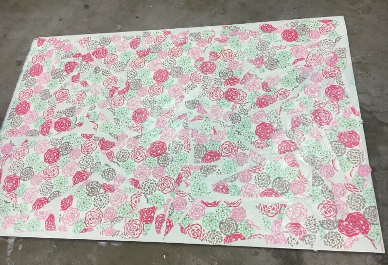 Decoupage pretty wrapping paper over layers of paint for a fun effect