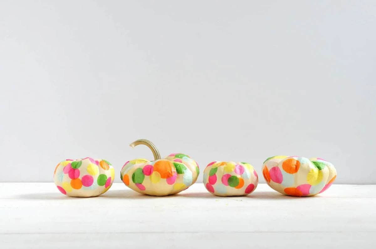 Tissue paper polka dots mod podged on mini pumpkins