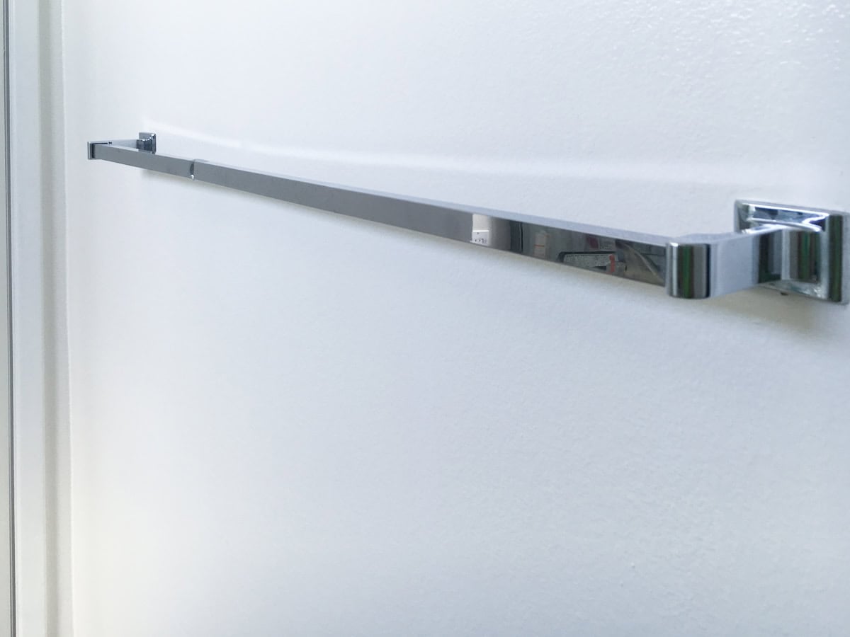 Towel bar before with dents