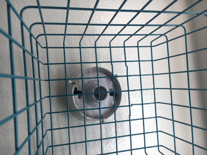 add a wire basket to the light fixture. Unique lampshade