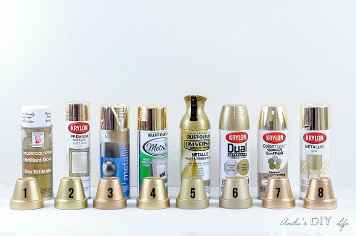 8 gold spray paint cans and 8 gold painted pots to test for the best gold spray paint