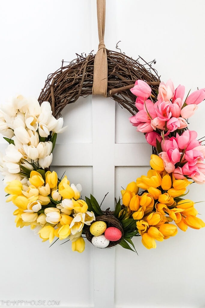 grapevine wreath covered with colorful tulips