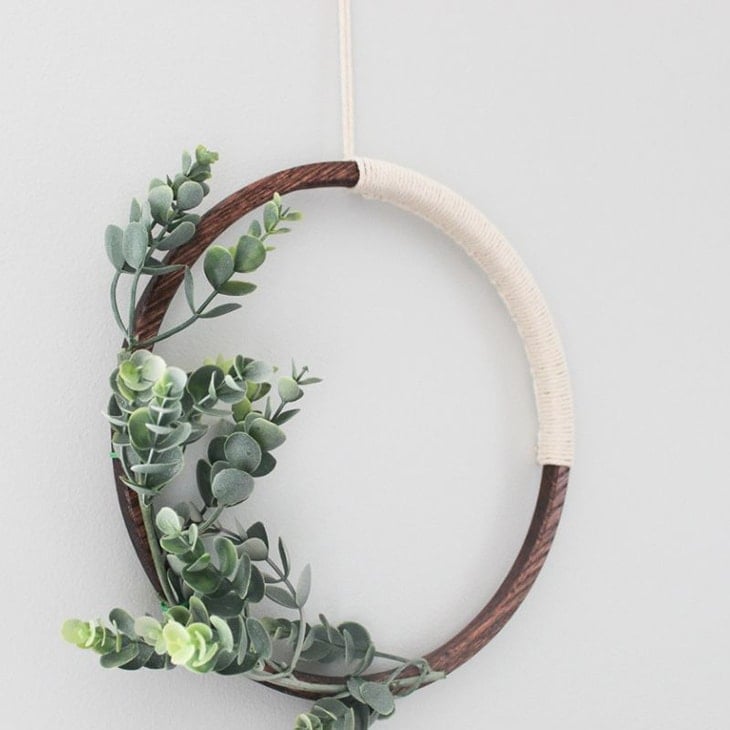 Simple wooden hoop wreath with macrame string and faux eucalyptus