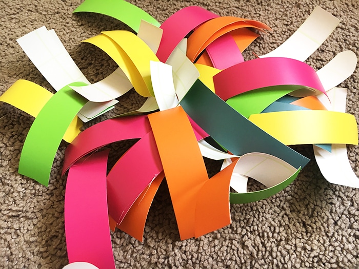 Create a sprinkles accent wall for a colorful playroom decor idea 