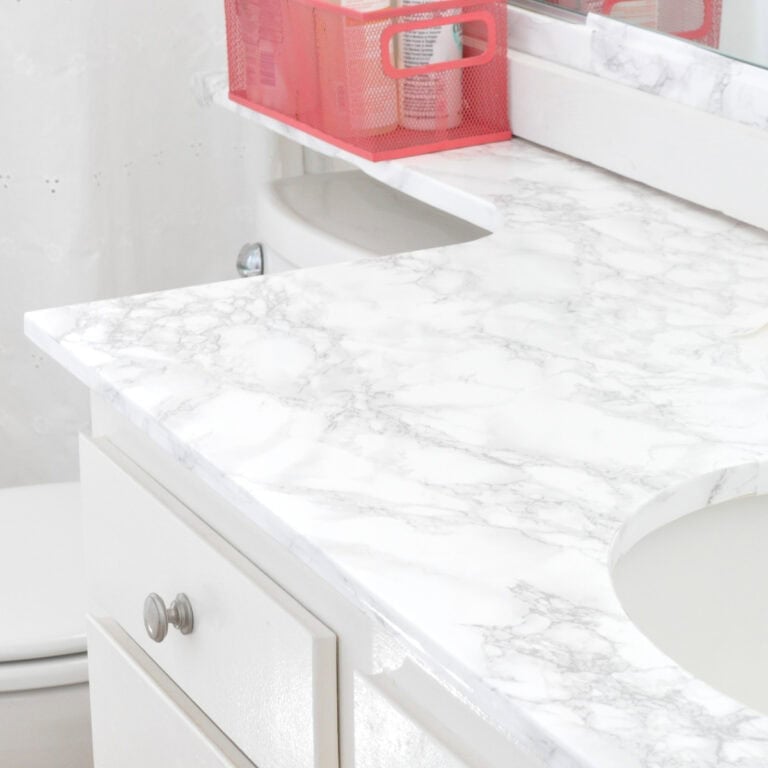 Is marble contact paper durable in bathrooms? See my 1-year countertop review. Plus how to remove it damage-free.