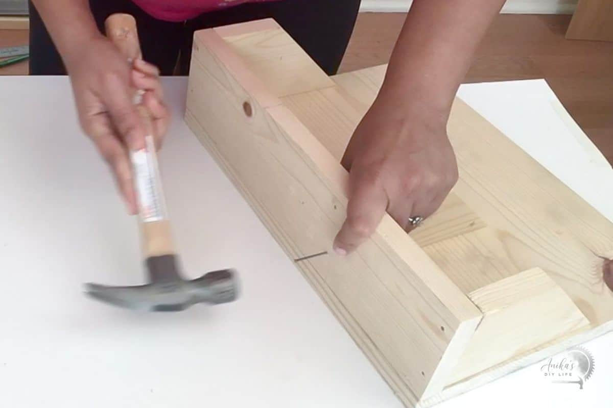 attaching dividers with hammer and nails