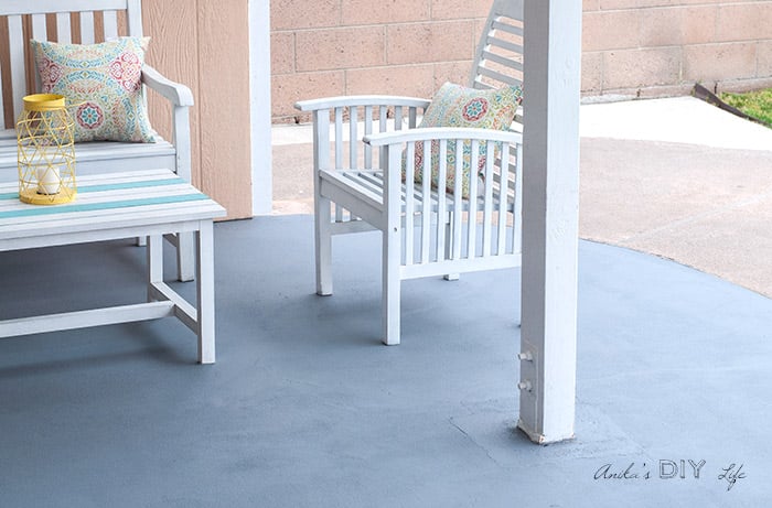 Outdoor space with stained patio and DIY furniture