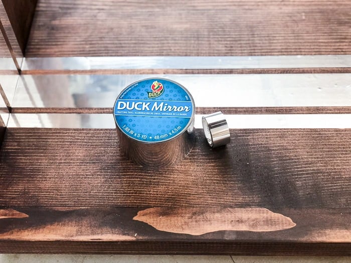 Using mirror tape to add the perfect touch to the DIY C-table