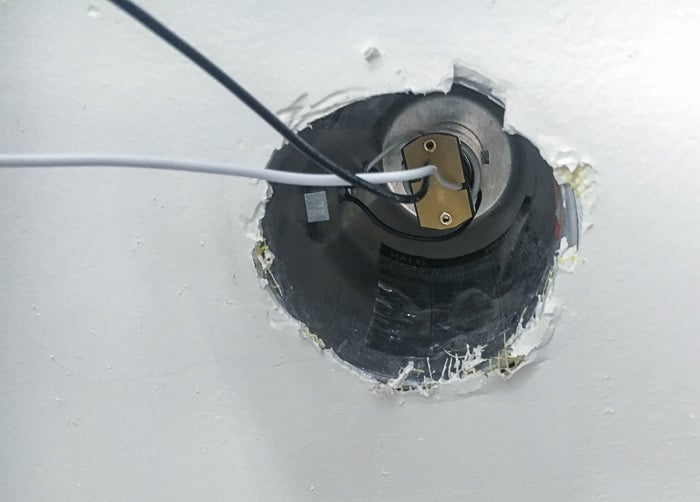 Can light replaced with a converter kit to convert recessed light to pendant light