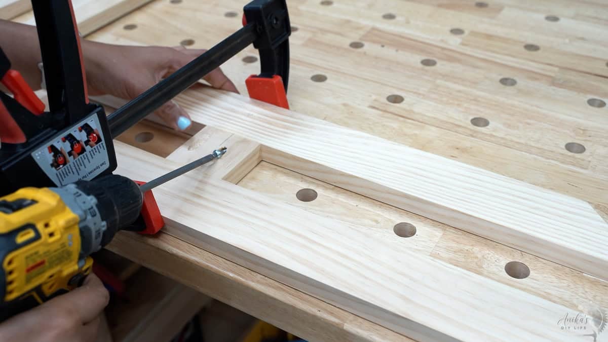 attaching the spacer block using pocket hole screws 