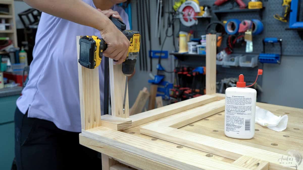 attaching the aprons to make the leg frame of the console table