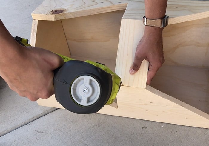 attaching fronts of the vegetable storage bin.
