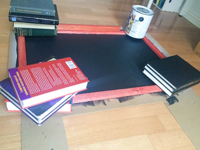 Project on floor with weight on it.