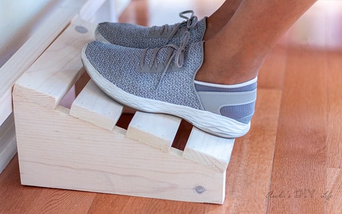 Woman resting feet on DIY footrest