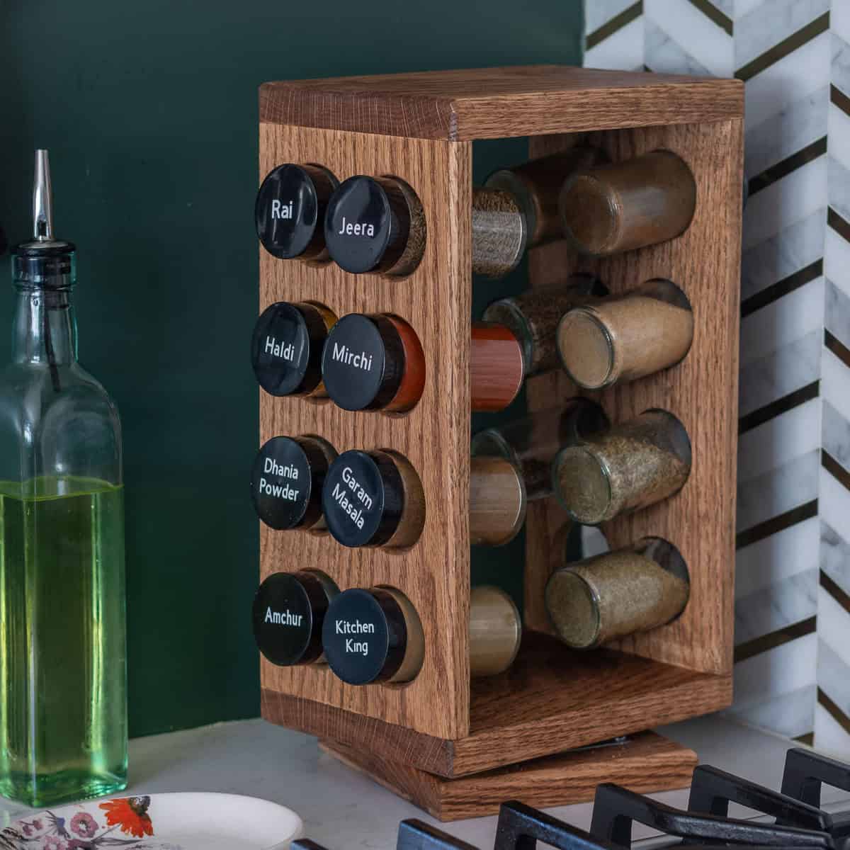 Build your own DIY rotating spice rack! This lazy susan wooden spice rack is an easy, one-day project perfect for kitchen organization and makes a great gift.