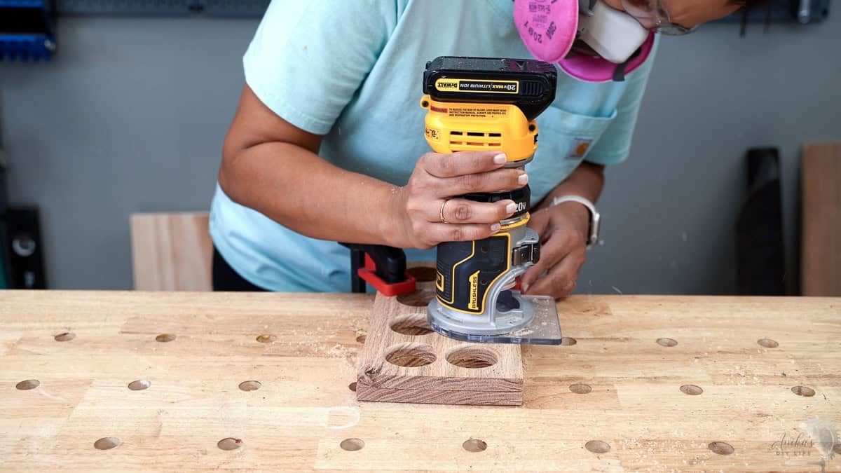 routing the insides of the holes for the spice rakc with a router