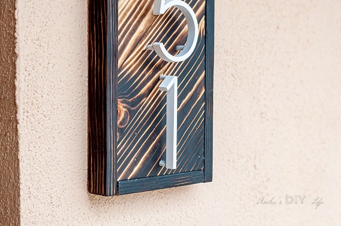 close up of the gradient wood burned DIY wooden house number sign