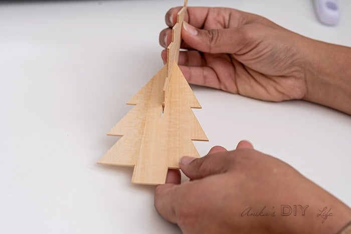 Attaching the two pieces of Christmas trees