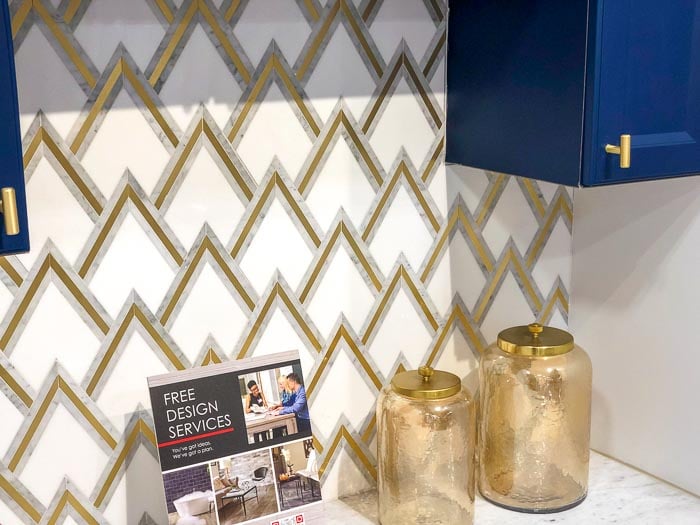 close up of navy blue and gold and white tile