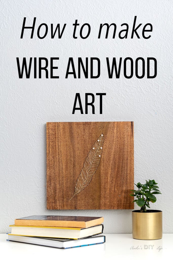 DIY wire and wood art on wall with books and plants