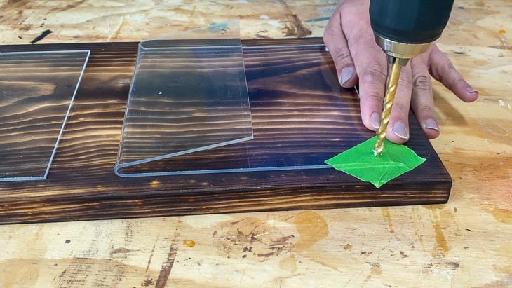 drilling holes in acrylic to attach the mail holders