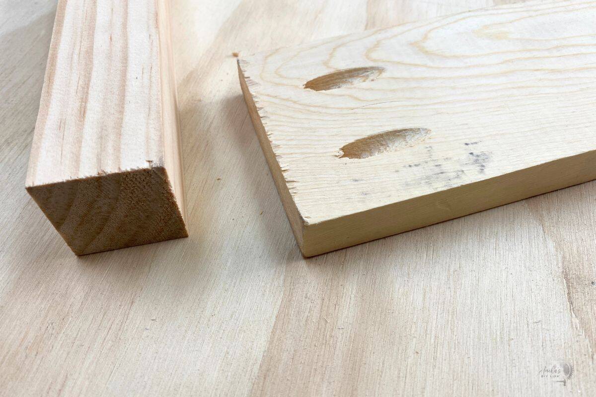 1x3 and a 2x2 board on a workbench. The pocket holes are on the 1x3 board
