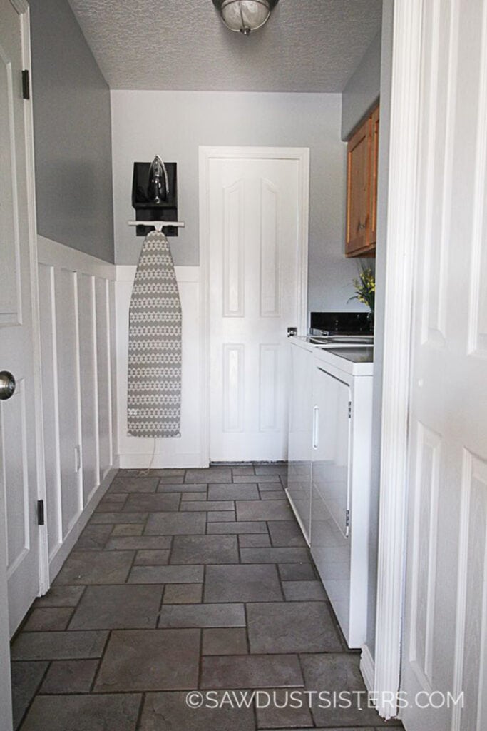 Laundry room with white board and batten
