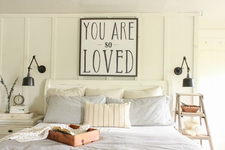 White bedroom with white board and batten accent wall