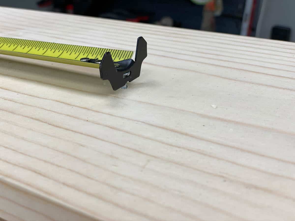 tape measure tab hooked on nail