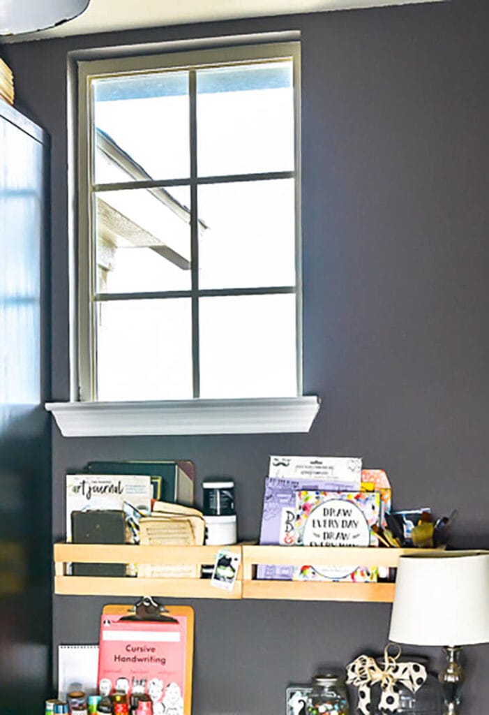 wood book and paper holder above a desk