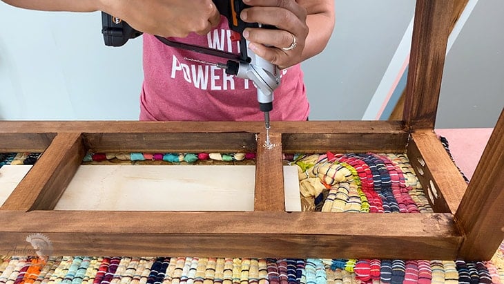 Attaching the upholstered top to the DIY bench frame