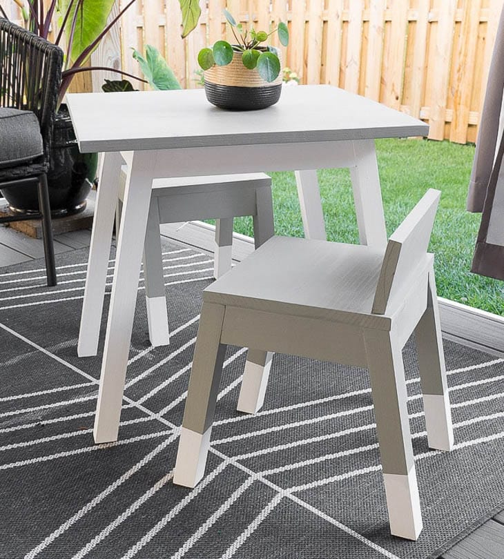 Gray painted kids angled leg chair with white block painted legs