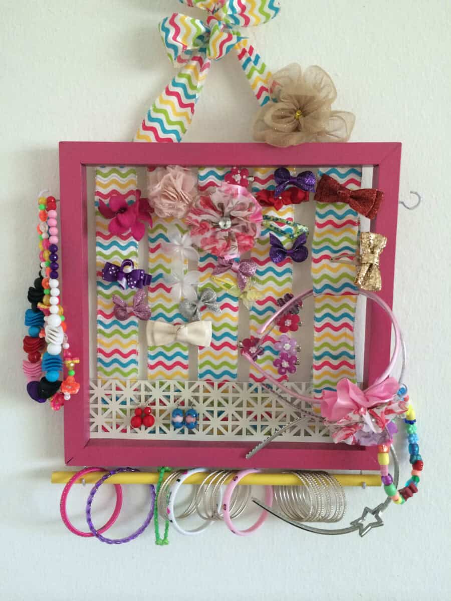 Pink wall mounted bow and jewelry organizer for girls