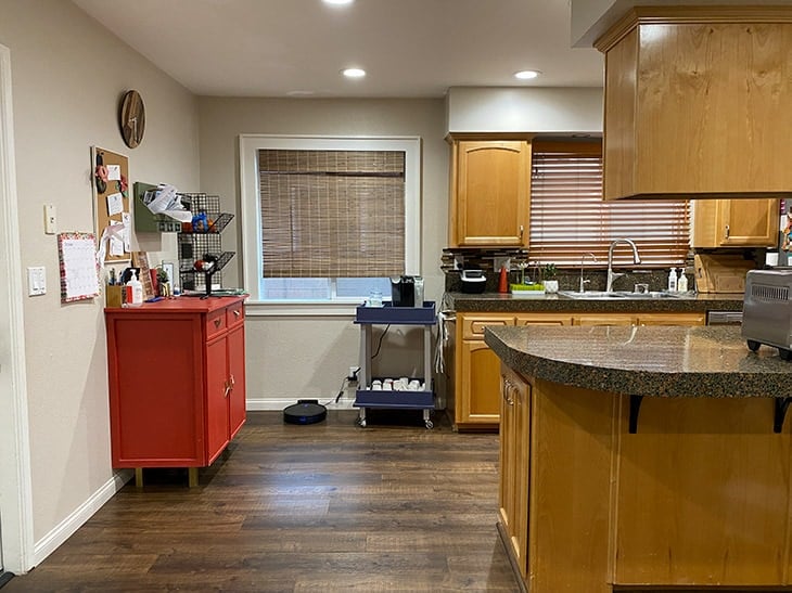 other view of before of kitchen with wondow and floor space