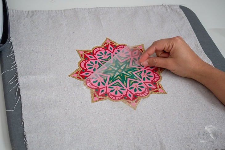 Woman layering Iron-on for making a gorgeous Indian inspired Living room decor
