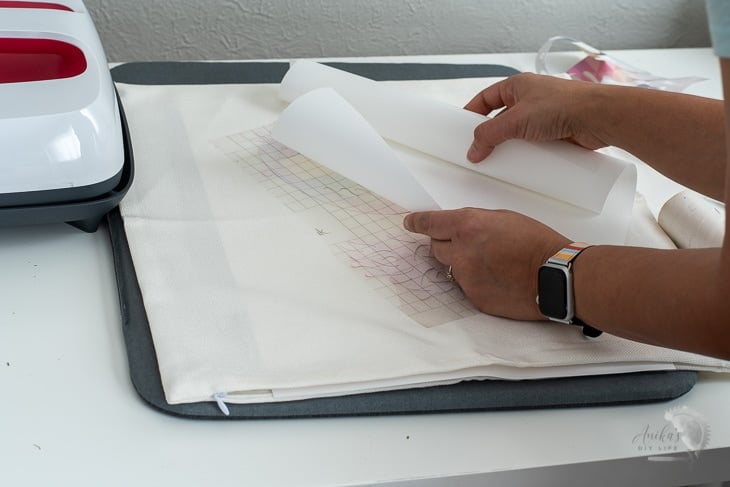getting ready to apply infusible ink transfer sheet to make the Cricut pillow