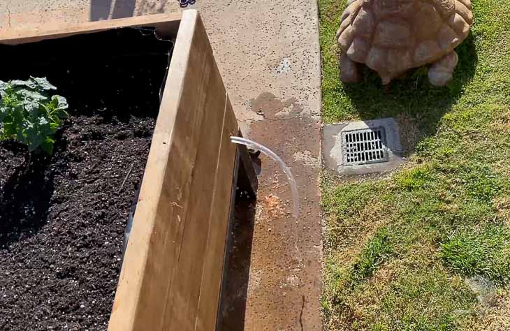 water flowing out of the overflow drain