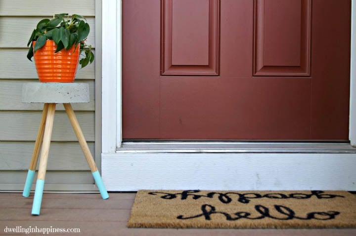 Concrete plant stand with wooden colorblock legs