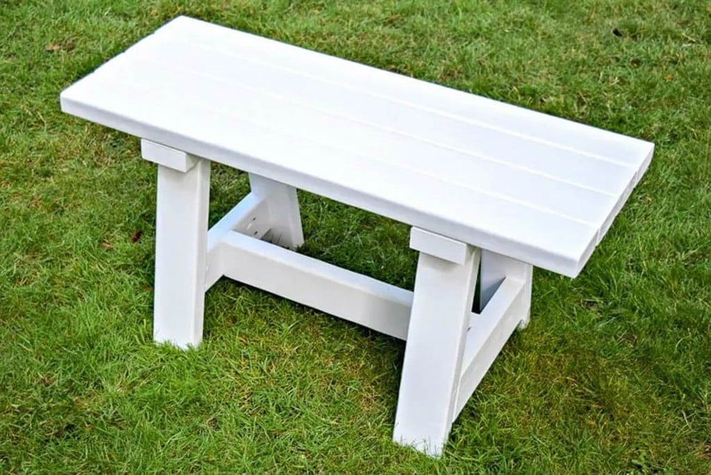 simple white farmhouse bench made from 2x4 scrap wood