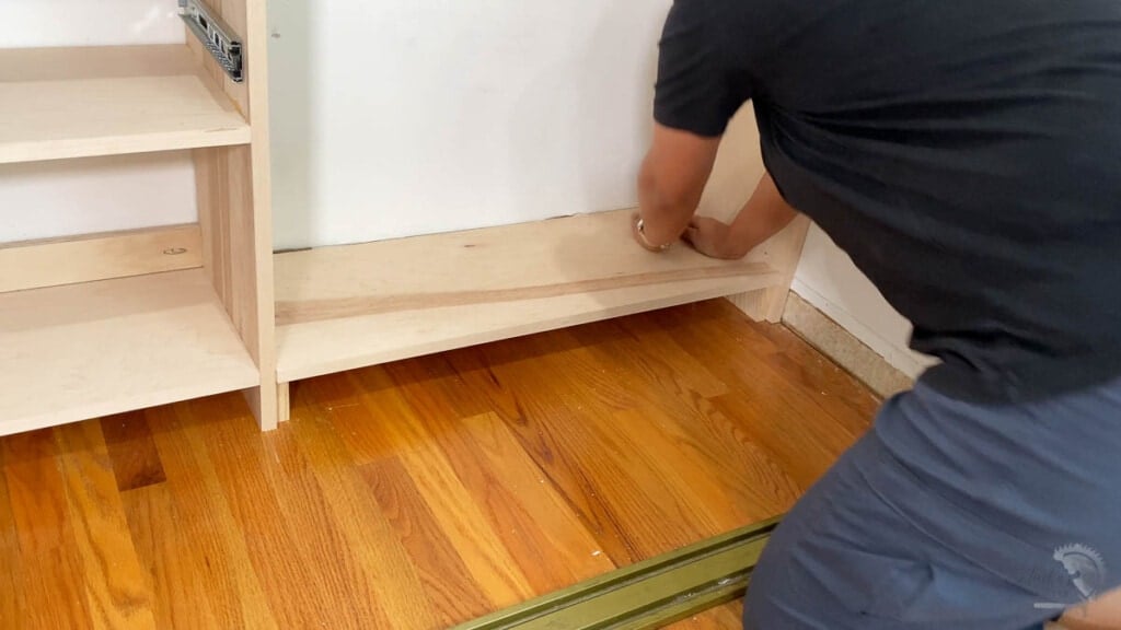 attaching bottom shelf to scrap 1x3 boards