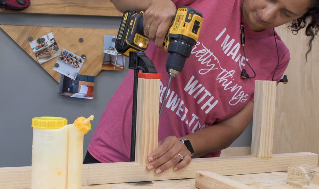 woman attaching boards using pocket hole screws