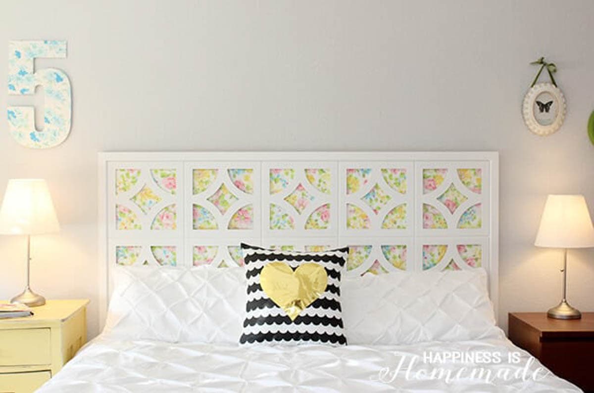 DIY headboard using cut outs and a vintage sheet