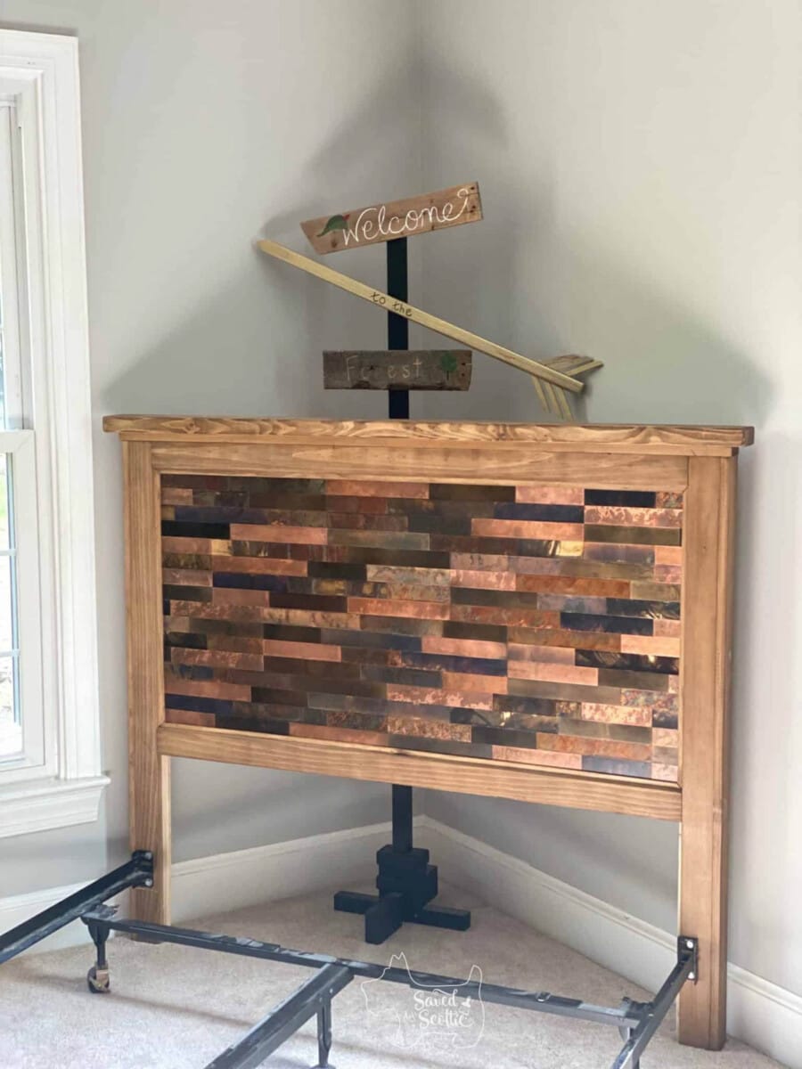 DIY headboard using stained wood boards
