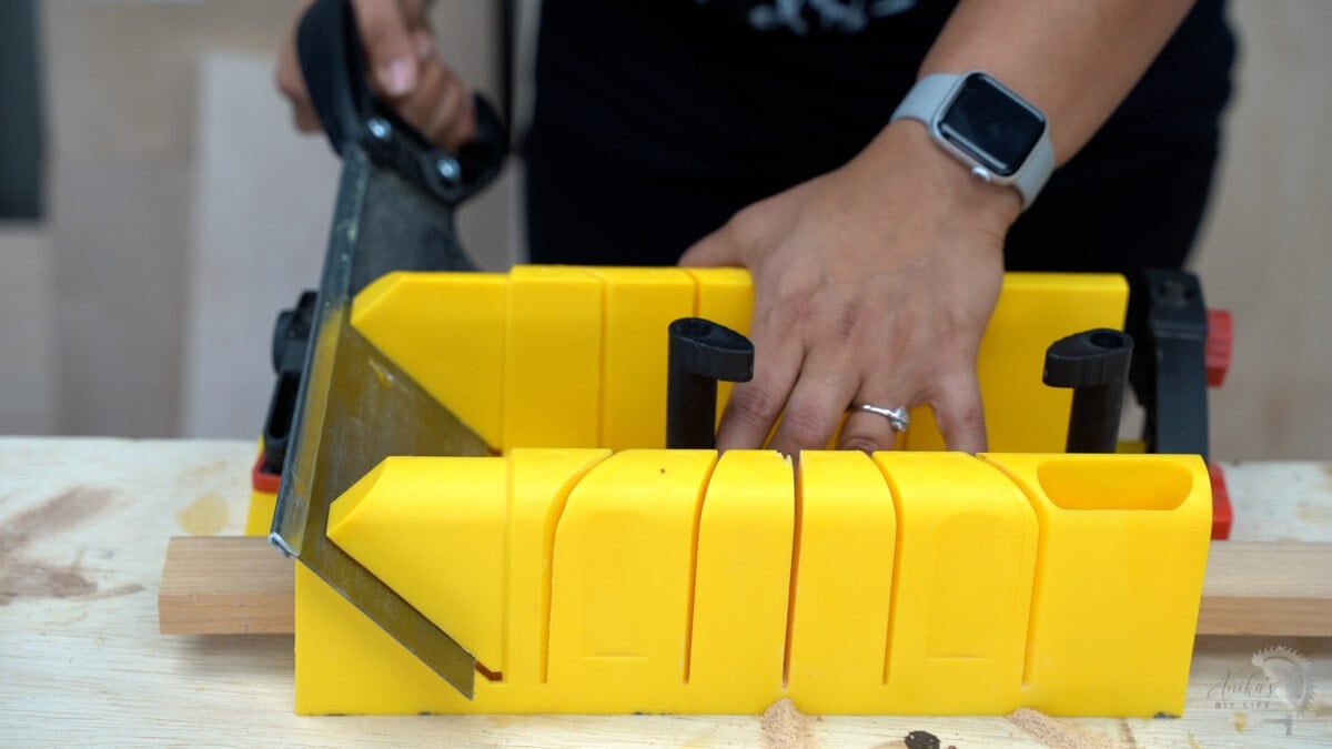 using a bevel slot to make a bevel cut at 45-degrees.